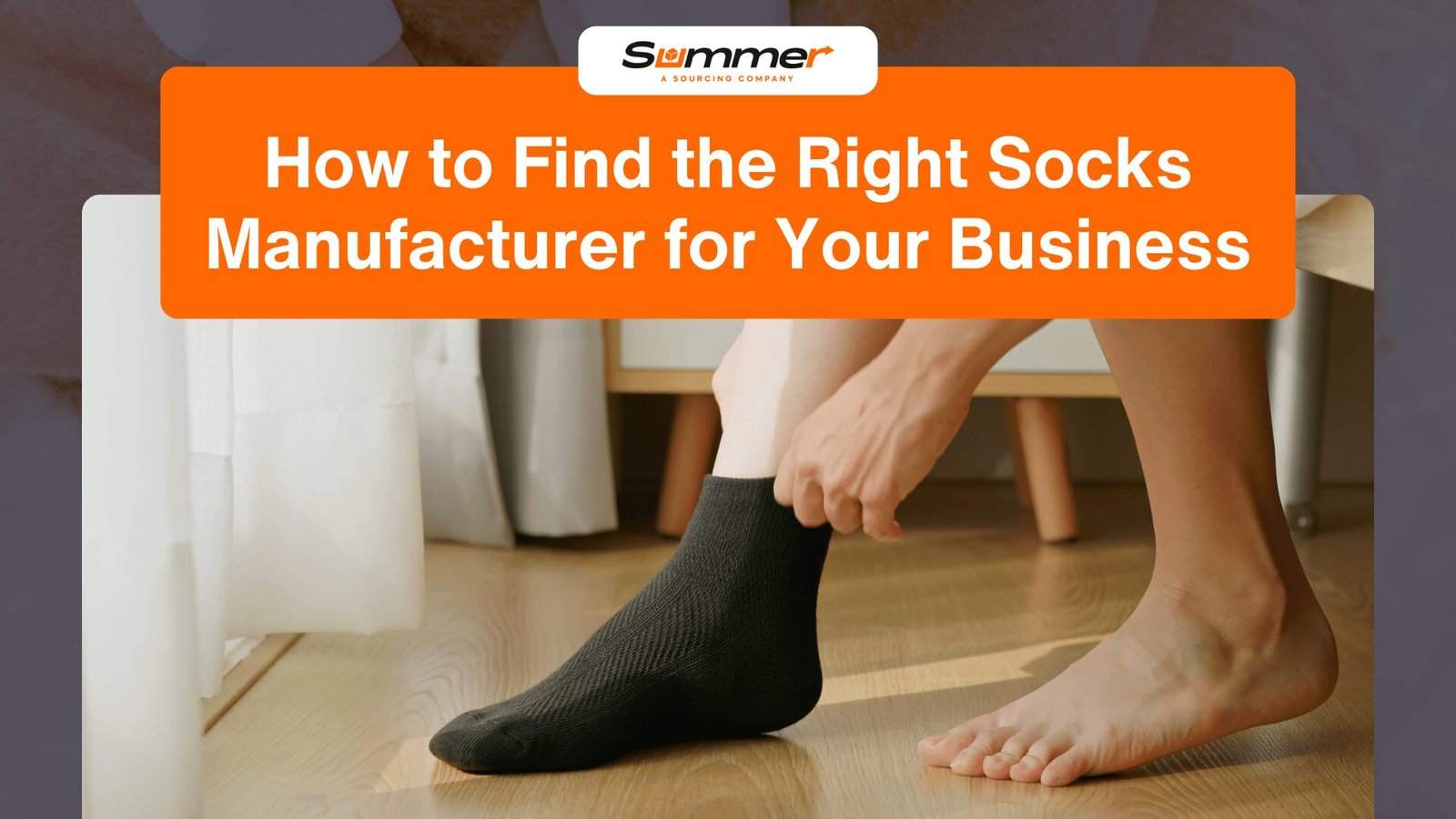 Person putting on black sock while sitting indoors, illustrating how to find the right socks manufacturer for your business needs